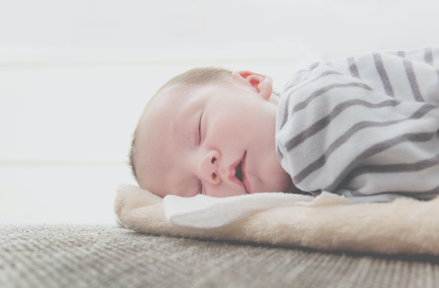milk coming out of baby nose