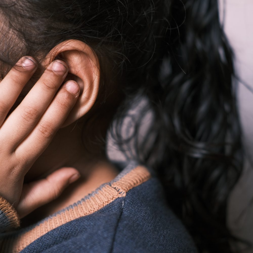 toddler covering ears